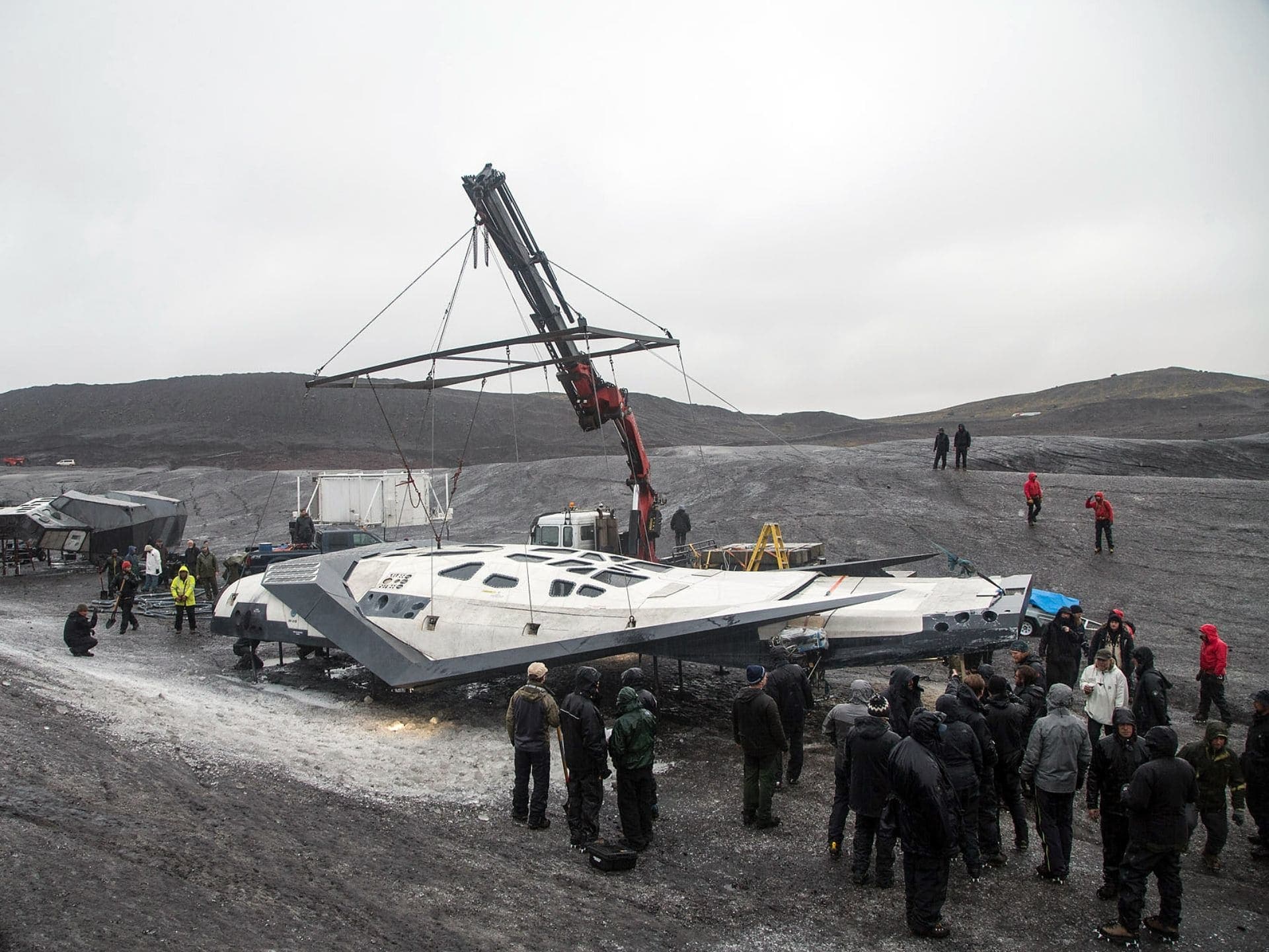 Behind-the-scenes image of the Ranger craft staged outdoors with crane and production crew.