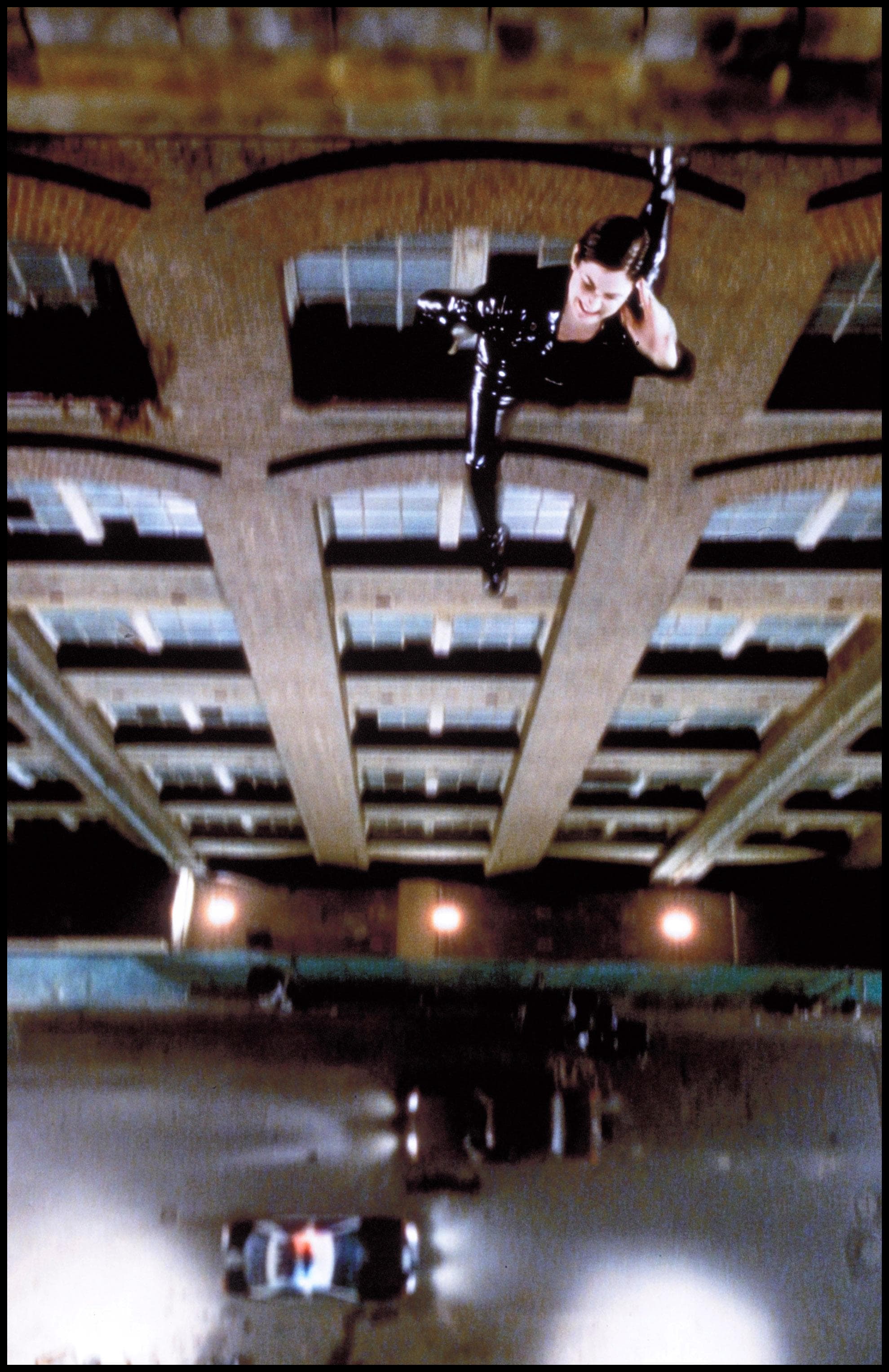 Behind-the-scenes image showing wire work and inverted action geometry during The Matrix production.