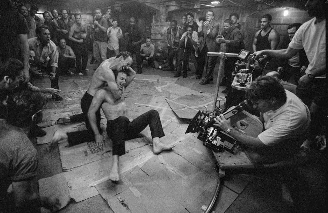 Behind-the-scenes image of a camera rig filming a Fight Club basement fight sequence.