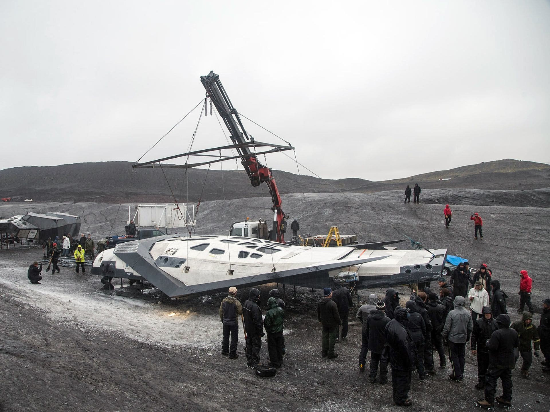 Behind-the-scenes image of the Ranger craft staged outdoors with crane and production crew.