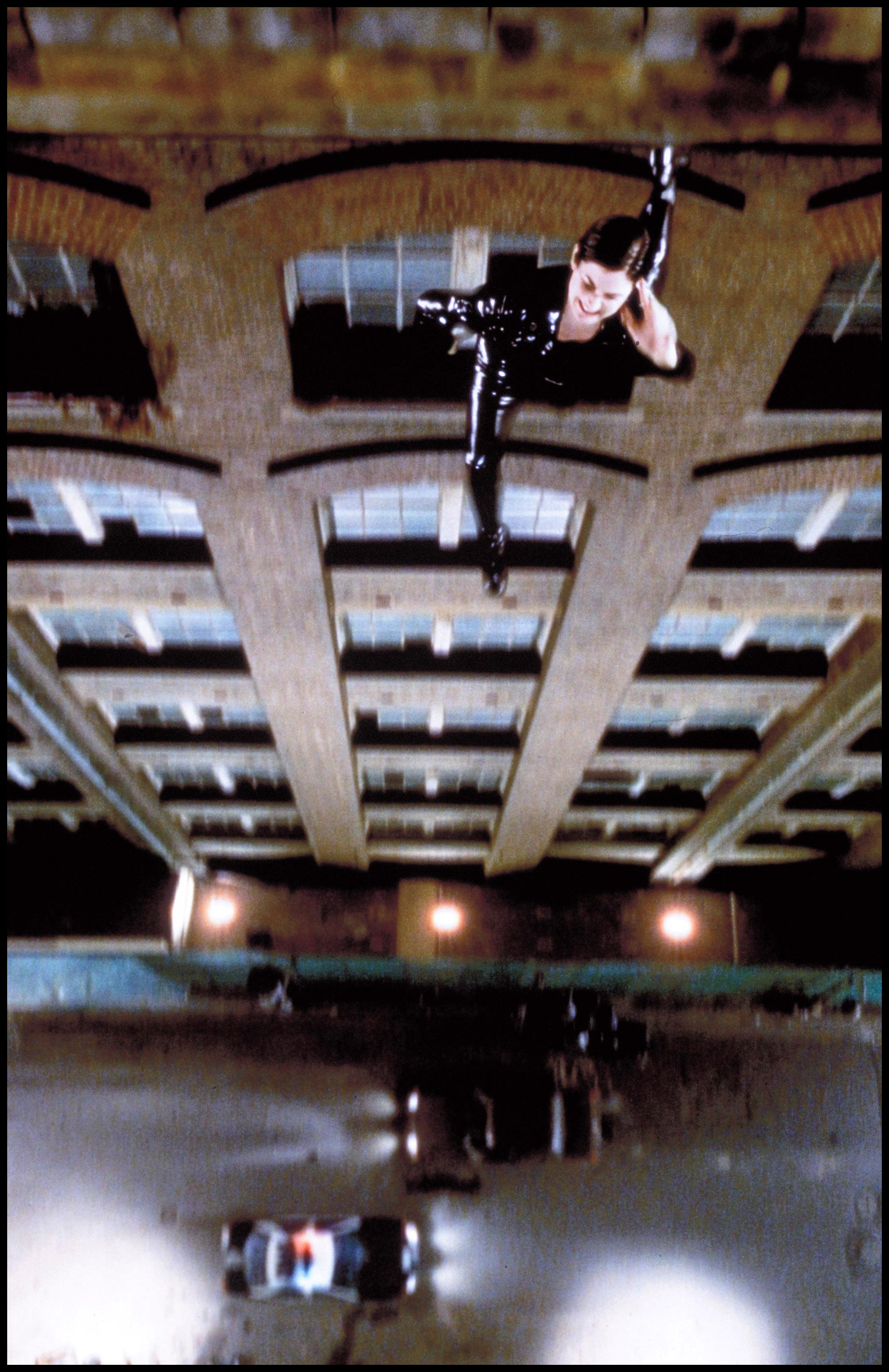 Behind-the-scenes image showing wire work and inverted action geometry during The Matrix production.
